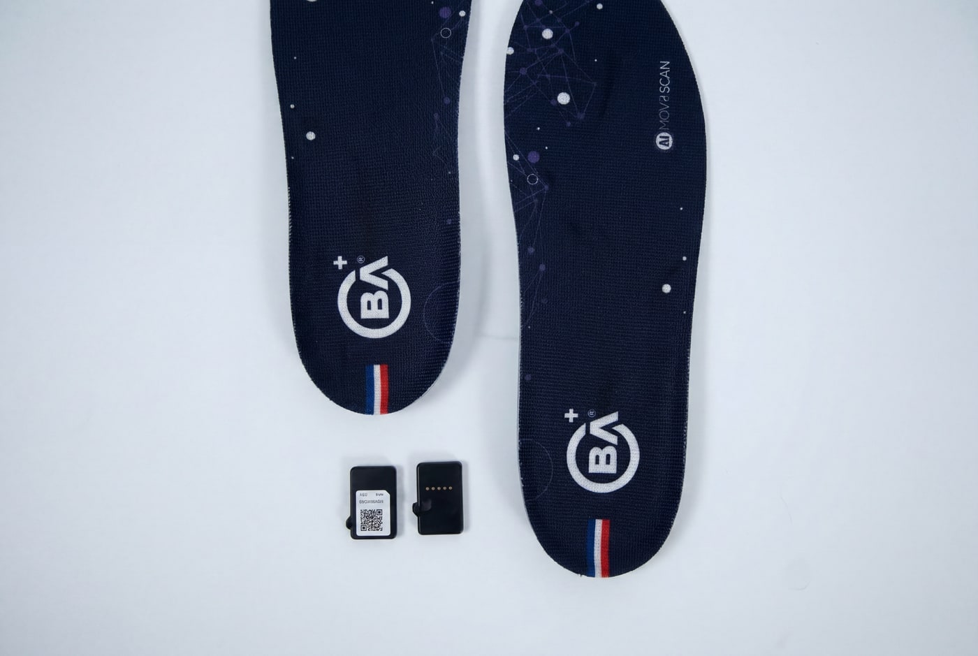 Baliston insoles and motion-sensor pods on a light background